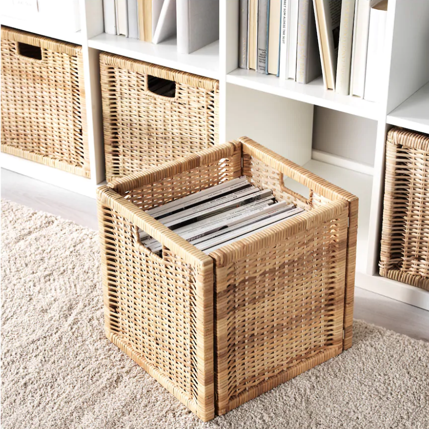 IKEA Branaes rattan basket with bookshelves behind