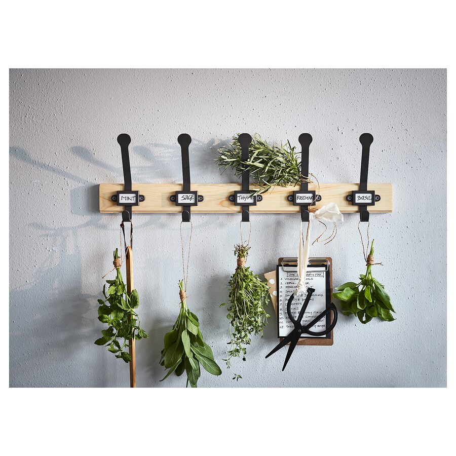 Herbs hanging on IKEA kartotek rack with 5 hooks