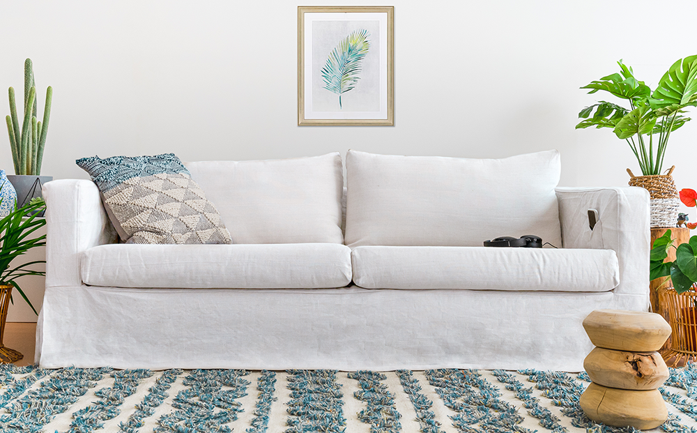 a white linen sofa made from pure linen