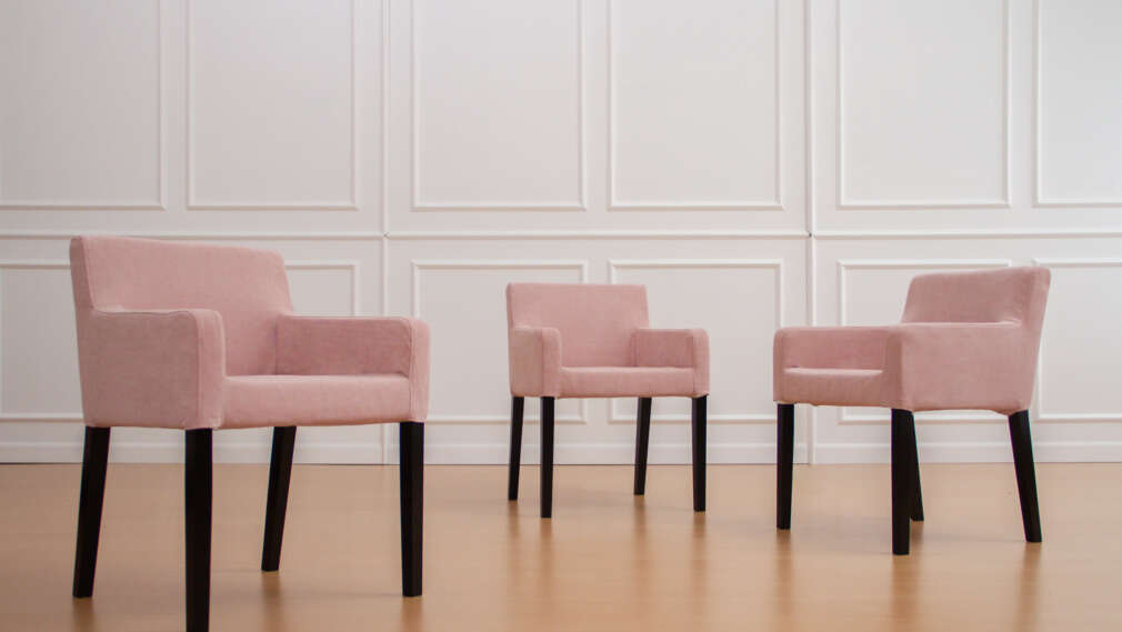 IKEA Nils dining chairs in pink slipcovers