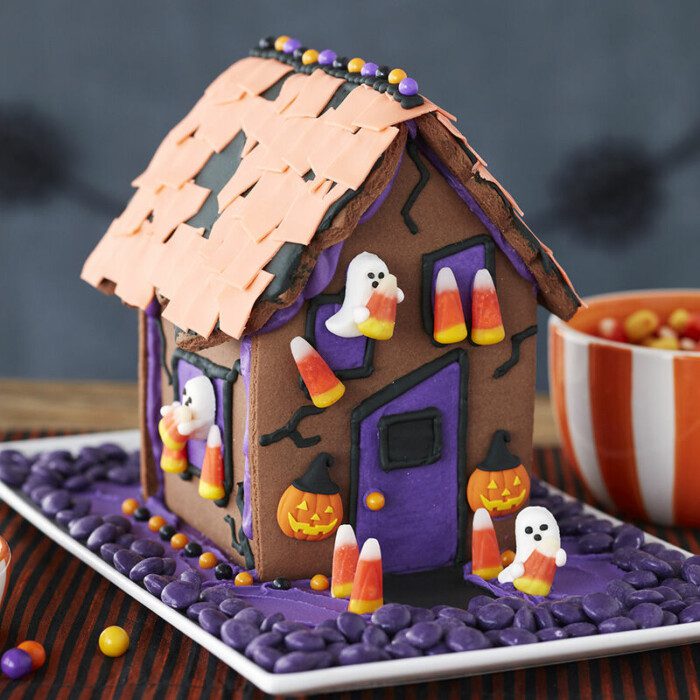 Halloween cookie house with candy ghost decorations