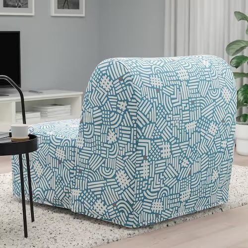 Patterned chair bed in living room